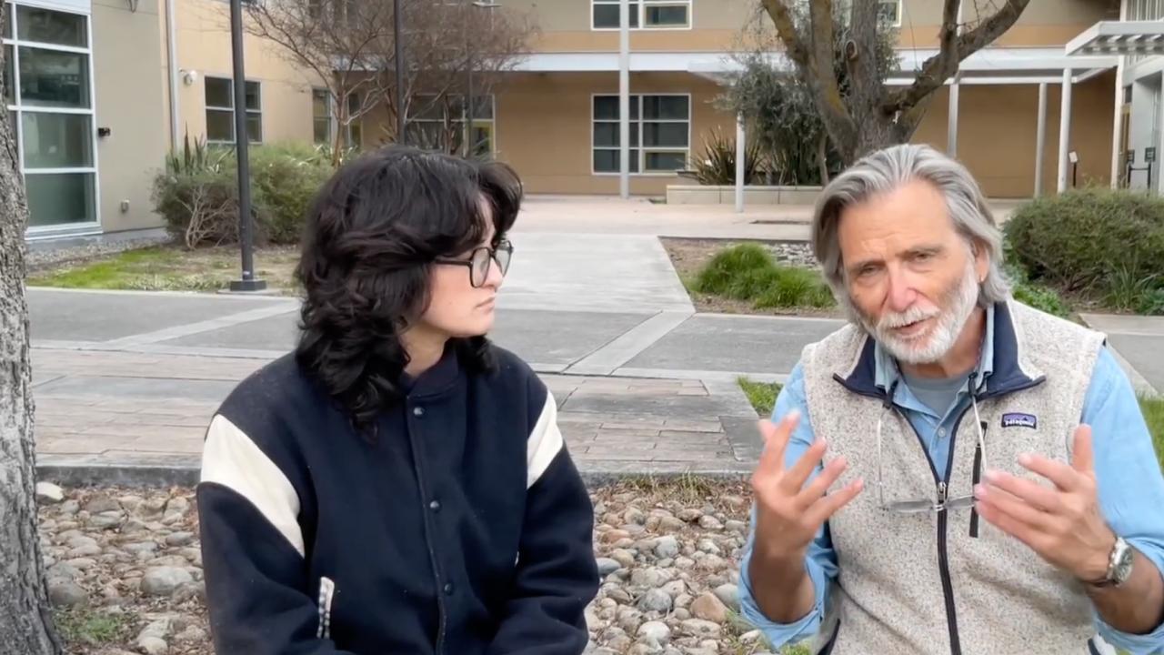 two people talk