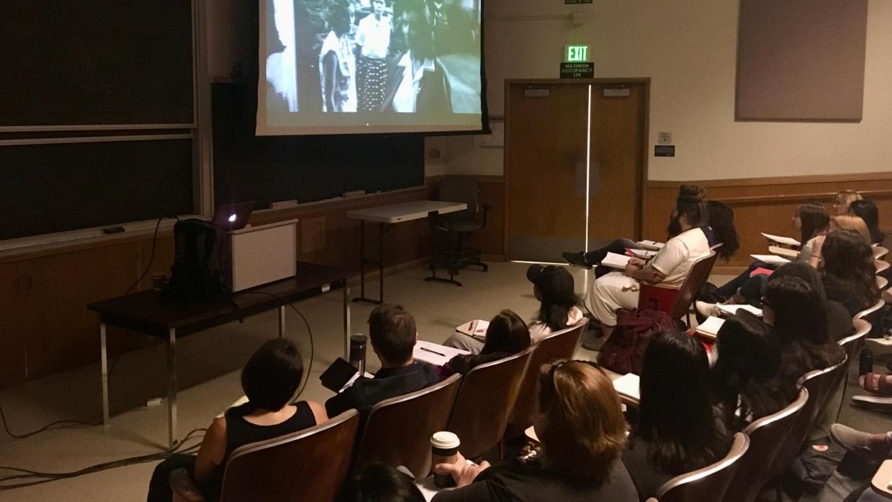 students watching film
