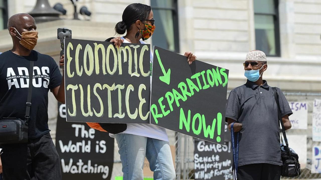 people speaking with signs